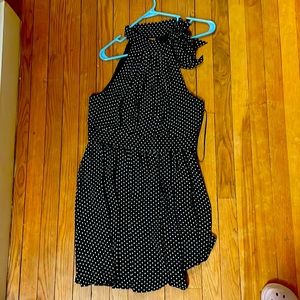 Black and white polka dot dress with bow neck detail